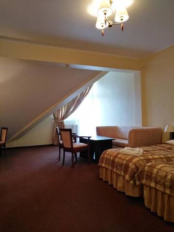 Фото номера Двухместный номер с 2 отдельными кроватями и окном Отель Hotel Umina г. Чорштын 5